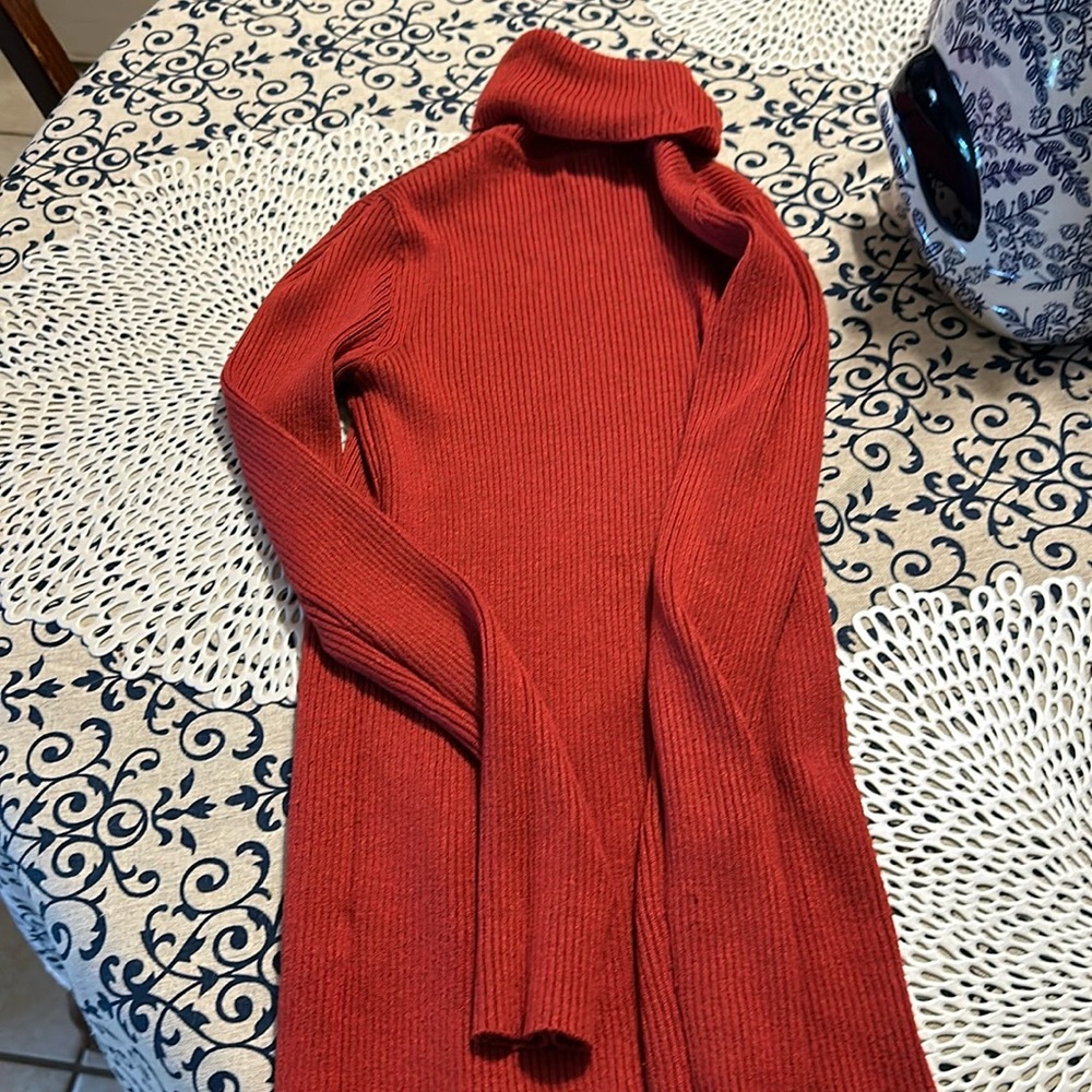 Orange turtle neck sweater